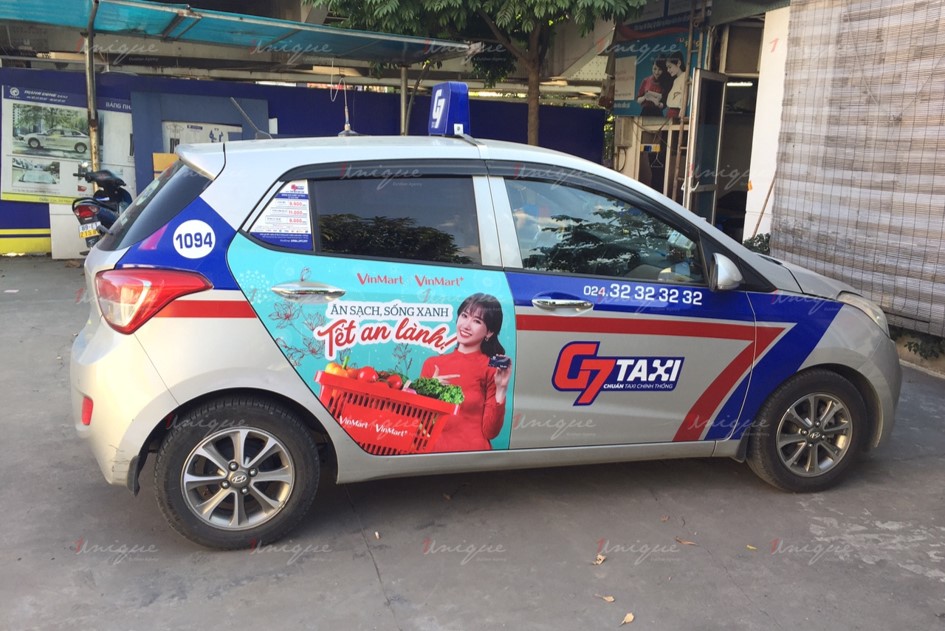 quảng cáo trên xe taxi g7